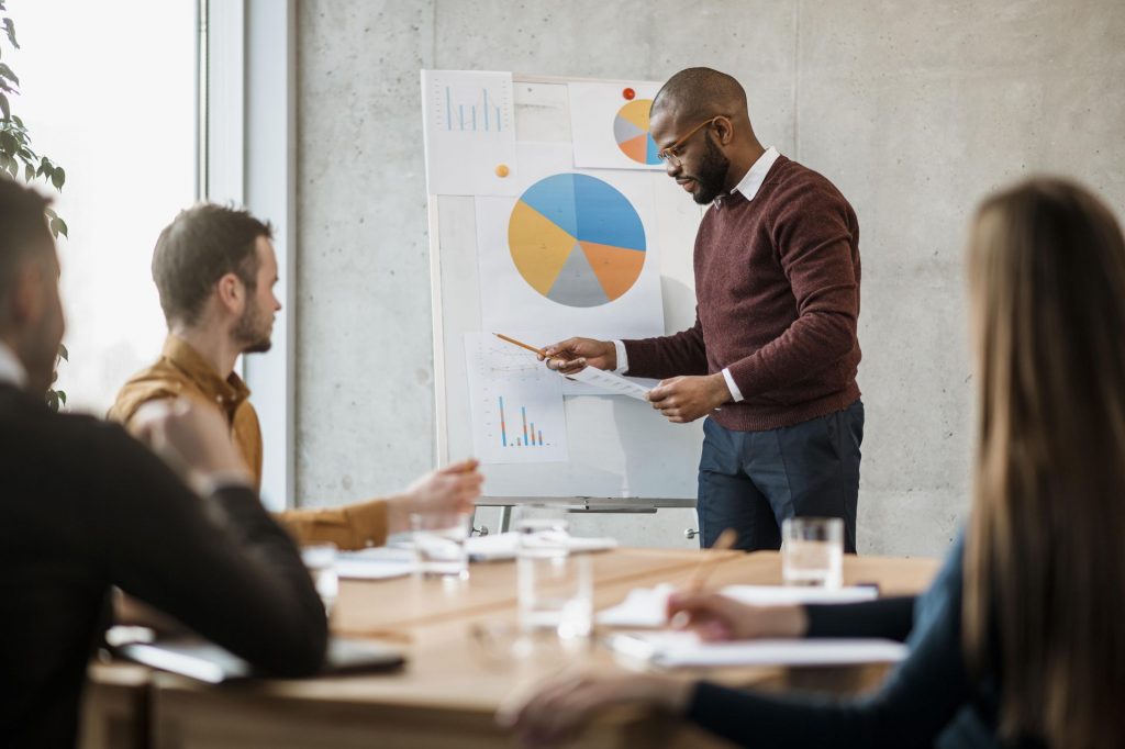 Side View Man Doing Presentation Meeting 1024x682